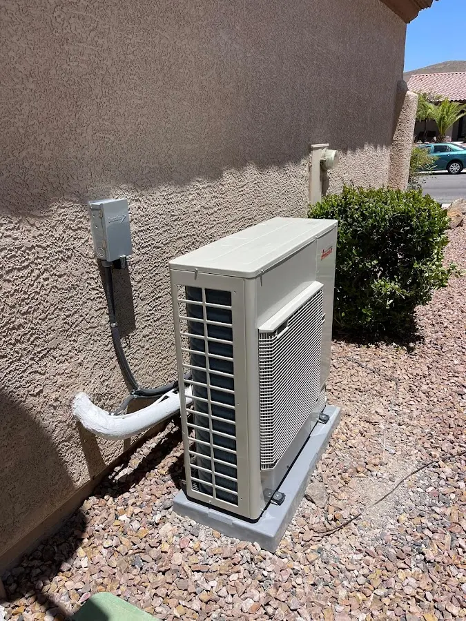 Residential air conditioning condenser unit in Canby